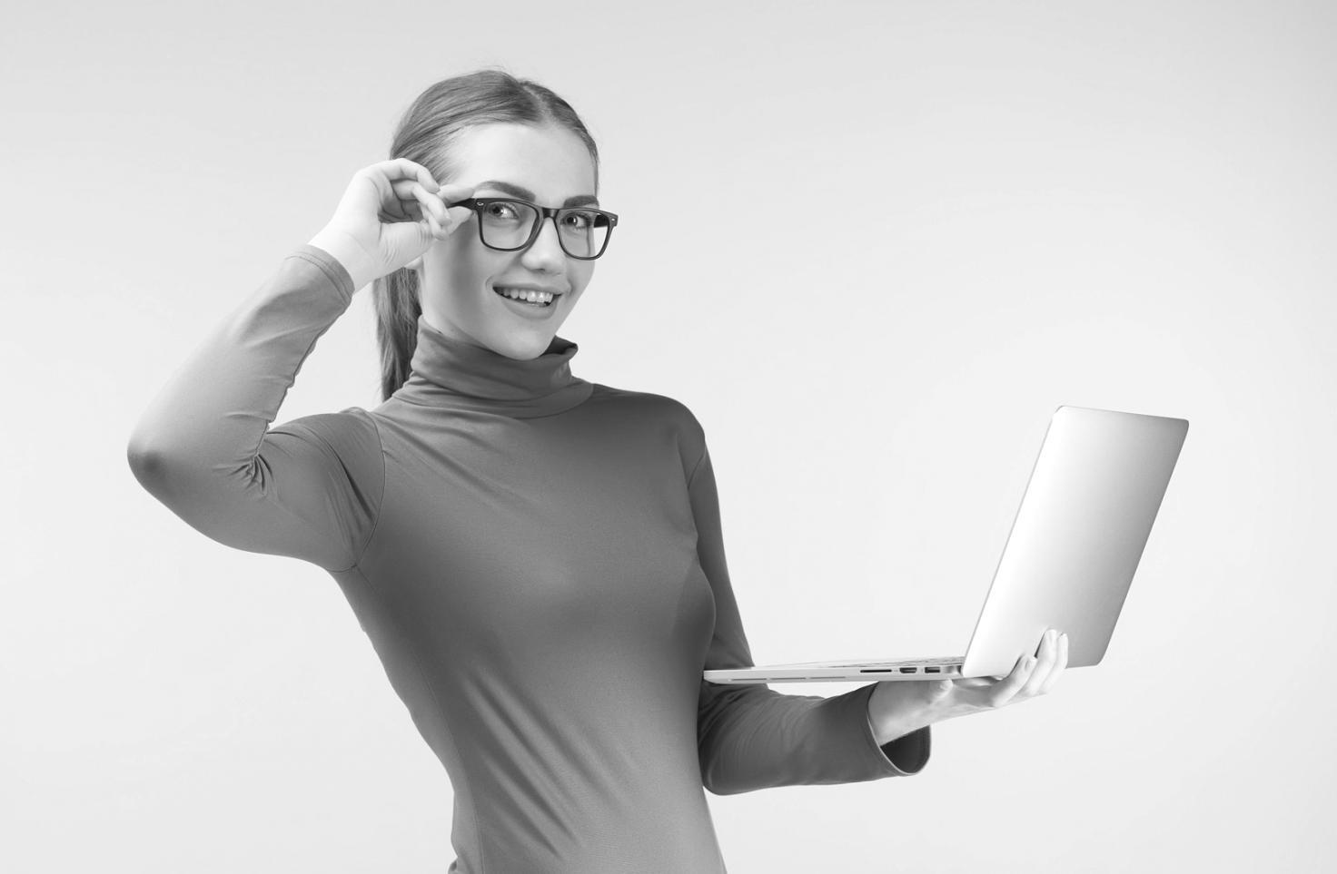 Students collaborating on coding projects in modern learning environment